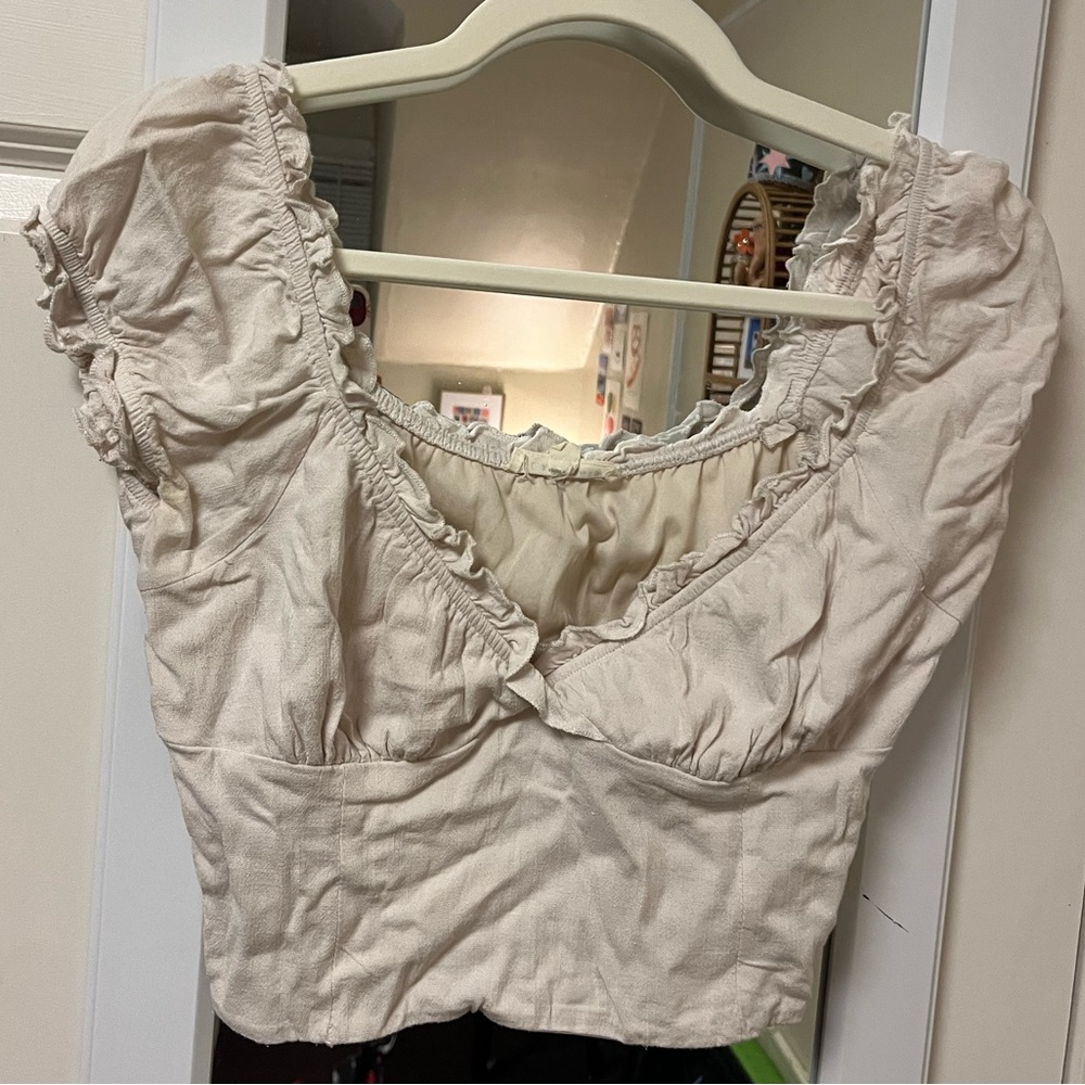 La Hearts Cream Ruffle Blouse